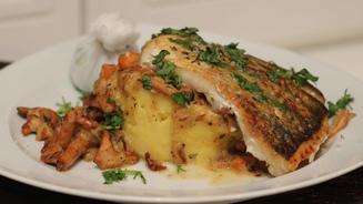 Zander umschmeichelt von Kräutern 