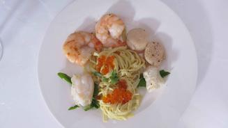 Pasta in Safran-Soße mit Seafood