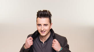 Ziehharmonika, Lederhose und Haartolle