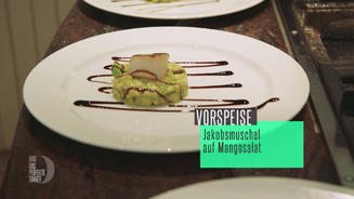 Jakobsmuschel auf Mangosalat