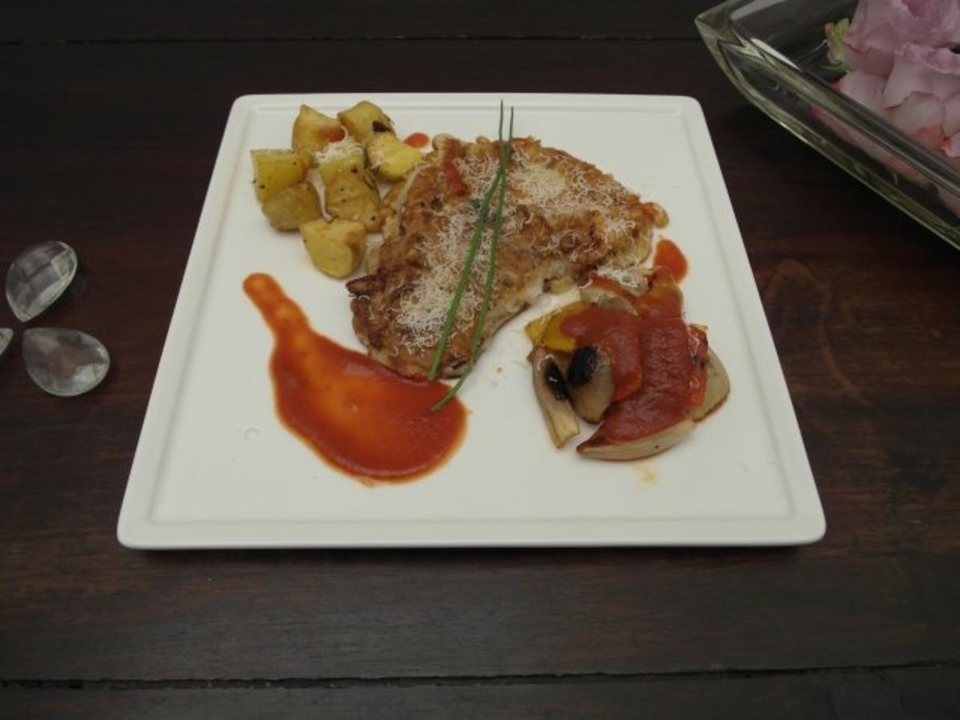 Churrasco rebozado mit Grillgemüse und gebackenen Kartoffeln