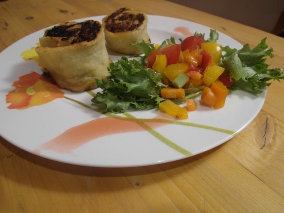 Krautkrapfen mit Salat