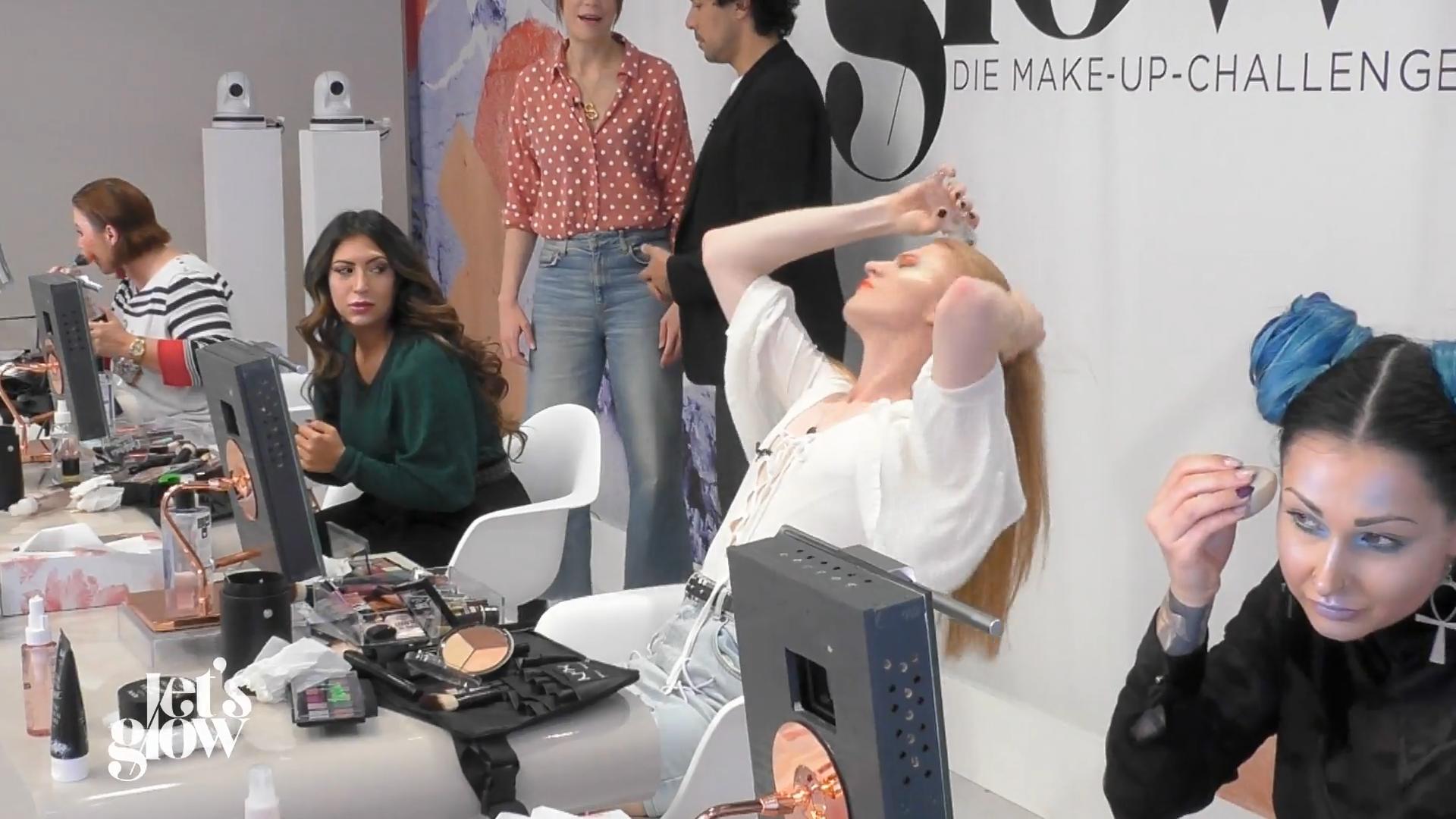 Veit regelt den Haar-Look mit der Wasserflasche
